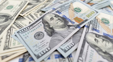 heap of dollars as background