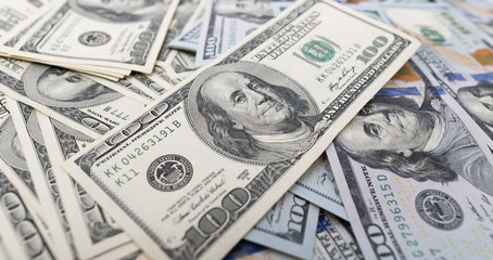 heap of dollars as background