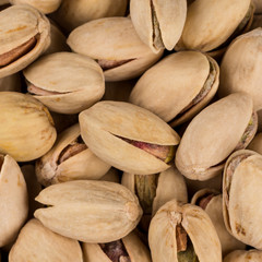 Pistachio nuts arranges as background
