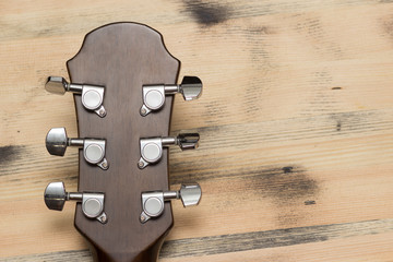 Guitar Neck on the old table wall