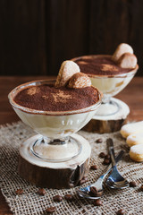 Italian dessert Tiramisu in a sundae dish