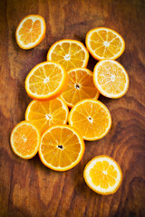 Naklejka na ściany i meble Healthy citrus fruits on a wooden background