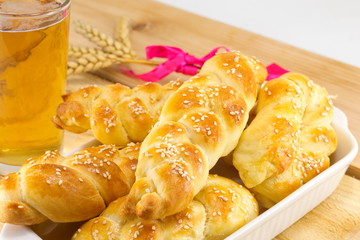 Homemade braid pastry and glass of beer