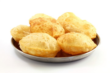puri or Poori traditional indian homemade deep fried bread or chapati - obrazy, fototapety, plakaty