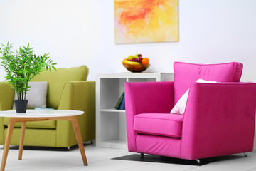 Interior of modern living room with armchairs
