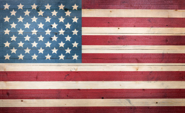 USA flag painted on faded wooden boards