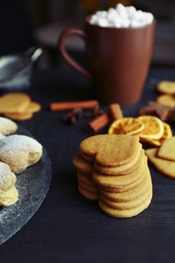 Heart shaped biscuits with marshmallow and sweet spaces on a table