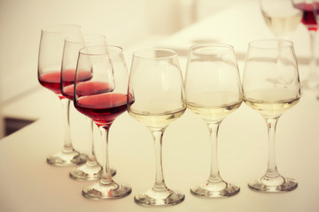 Wine glasses with red and white wine, closeup
