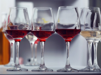 Wine glasses with red and white wine, closeup