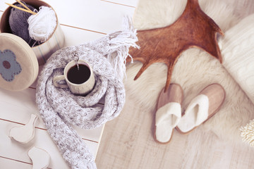 Cup of hot drink in living room. Comfortable winter weekend or holidays at home