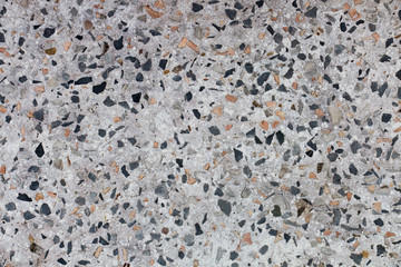 Pebbles in cement texture background