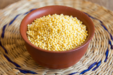organic millet in ceramic bowl
