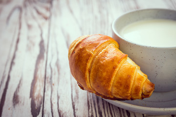 Croissant and milk. Breakfast concept