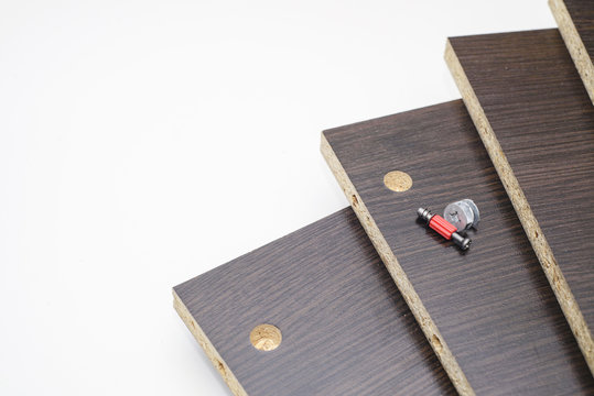  screws and metal hinges, furniture chipboard