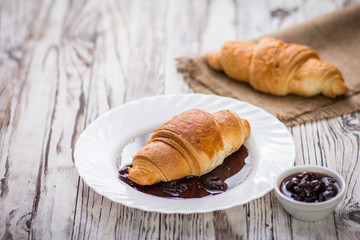traditional croissants with jam for breakfast