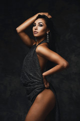 sexy raven indian lady posing seductively in front of camera