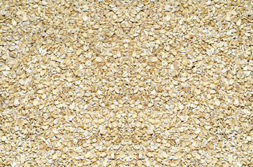 Background of oats rassypannoj on the surface