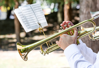 military brass band musician with trumpet