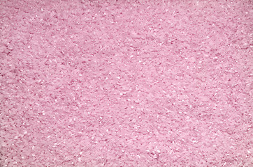 Textured background of rice grains on the surface