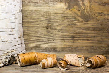Rolls of birch Bark on wooden