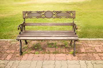 bench is in a  green park
