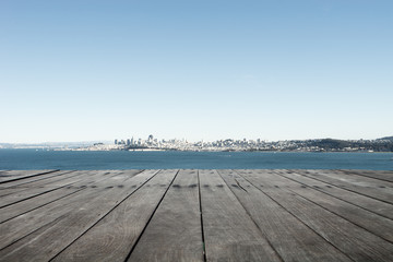 old wood floor with landscape of sea and sky