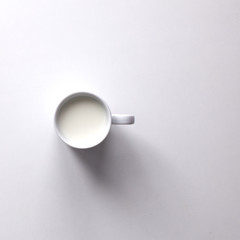 Mug of milk on white background, top view - 103965940
