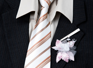 wedding groom suit ,tie and flower closeup