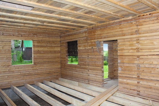 Wooden house under construction interior view
