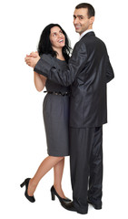 Couple dance, studio portrait on white. Dressed in black suit.