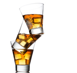 Three glasses of whiskey on the rocks
