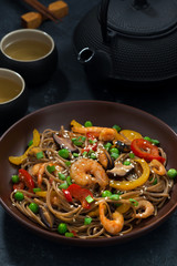 Asian lunch. Buckwheat noodles with seafood and vegetables