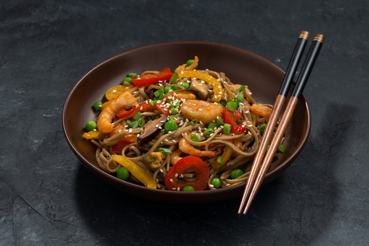 Buckwheat noodles with seafood in a bowl
