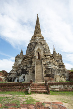 The Stupa placed at an ancient temple called Wat (temple) Phra Si Sanphet, was built over 600 years ago. The temple is on the site of the old Royal Palace in Thailand's ancient capital of Ayutthaya.