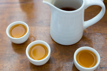 Cup of tea with teapot