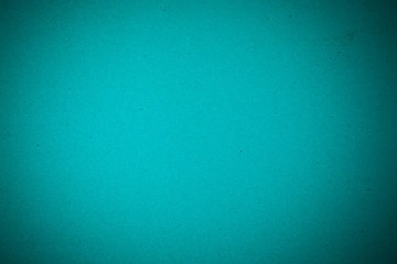 Cardboard sheet of green paper.