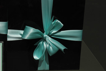 Gift box with blue ribbon