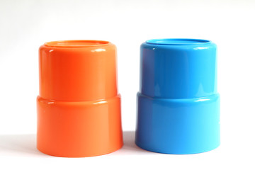 Blue and orange color plastic glass