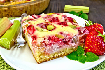 Pie strawberry-rhubarb with sour cream on table