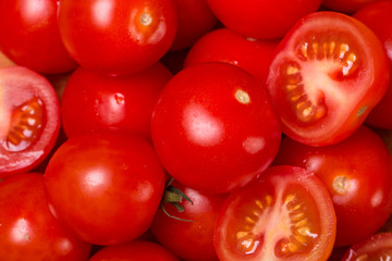 Fresh cherry tomatoes on wooden table ,diet concept