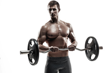 Fototapeta na wymiar Young handsome man with naked torso and barbell 