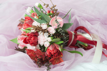 beautiful spring bouquet of carnations and tulips