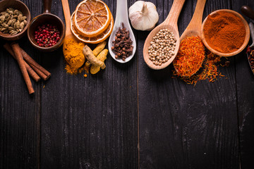 spices and herbs on wooden table , medicinal concept