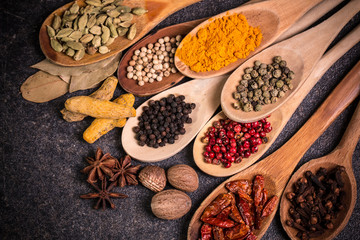 spices and herbs on wooden table , medicinal concept