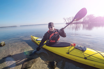man in sunglasses with the kayak