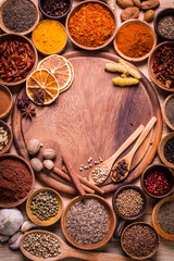 spices and herbs on wooden table.