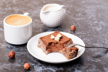 cup of espresso, milk and cakes, close up, horizontal