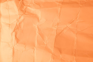 Texture creased orange paper background.