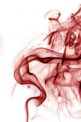 Red smoke on a white background.