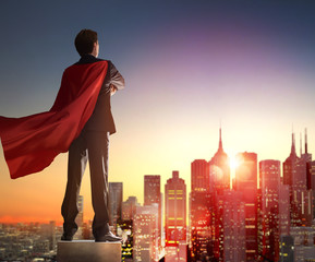 superhero businessman looking at city